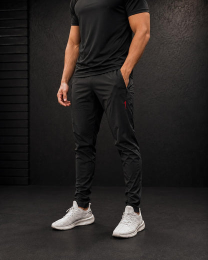 Aspire1 Technical Trousers, tapered leg with zipped pocket and red 1