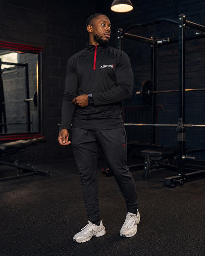 Aspire1 Technical Trousers worn with the 1/4 Zip
