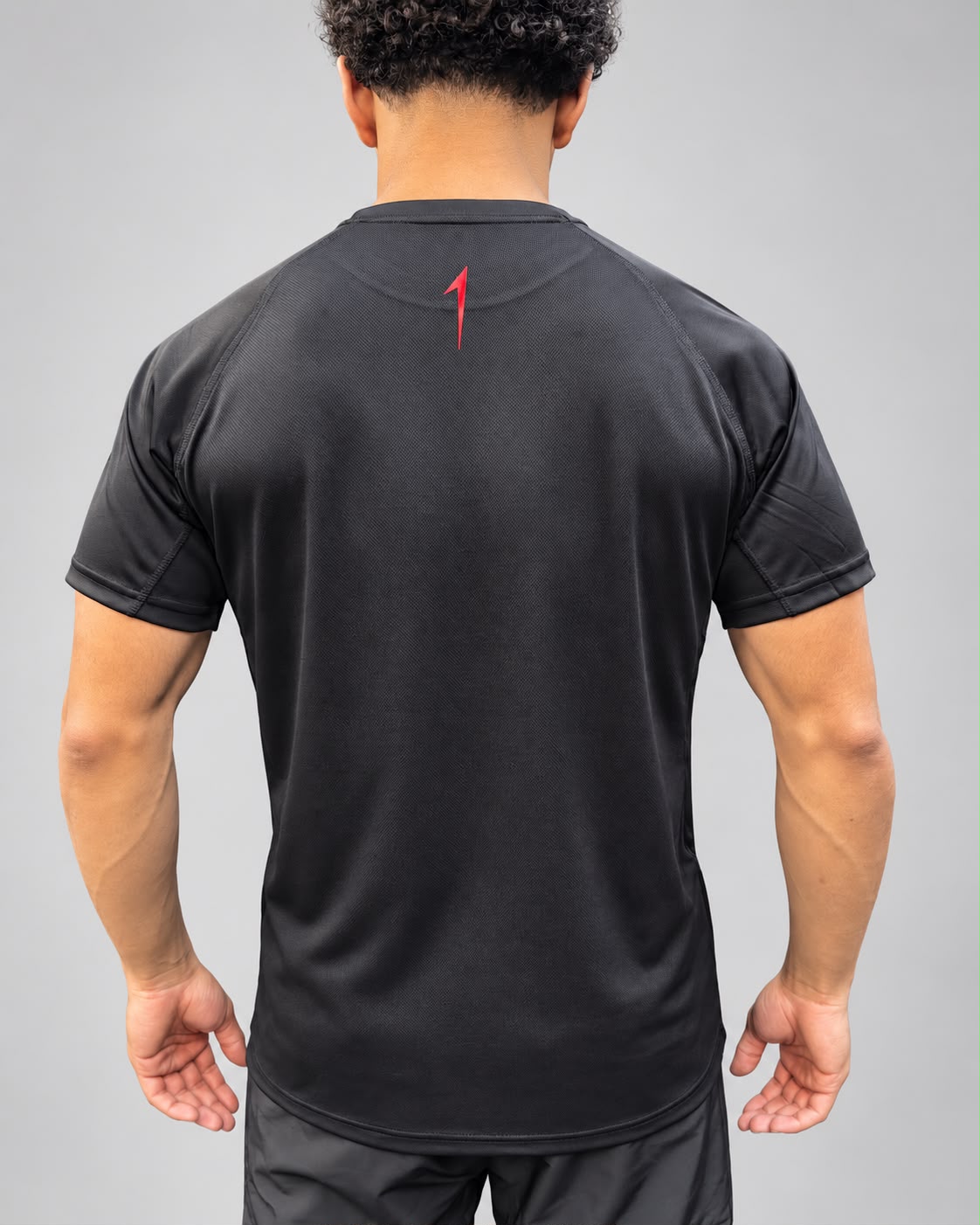 Aspire1 Tech T back view with red 1 below the collar